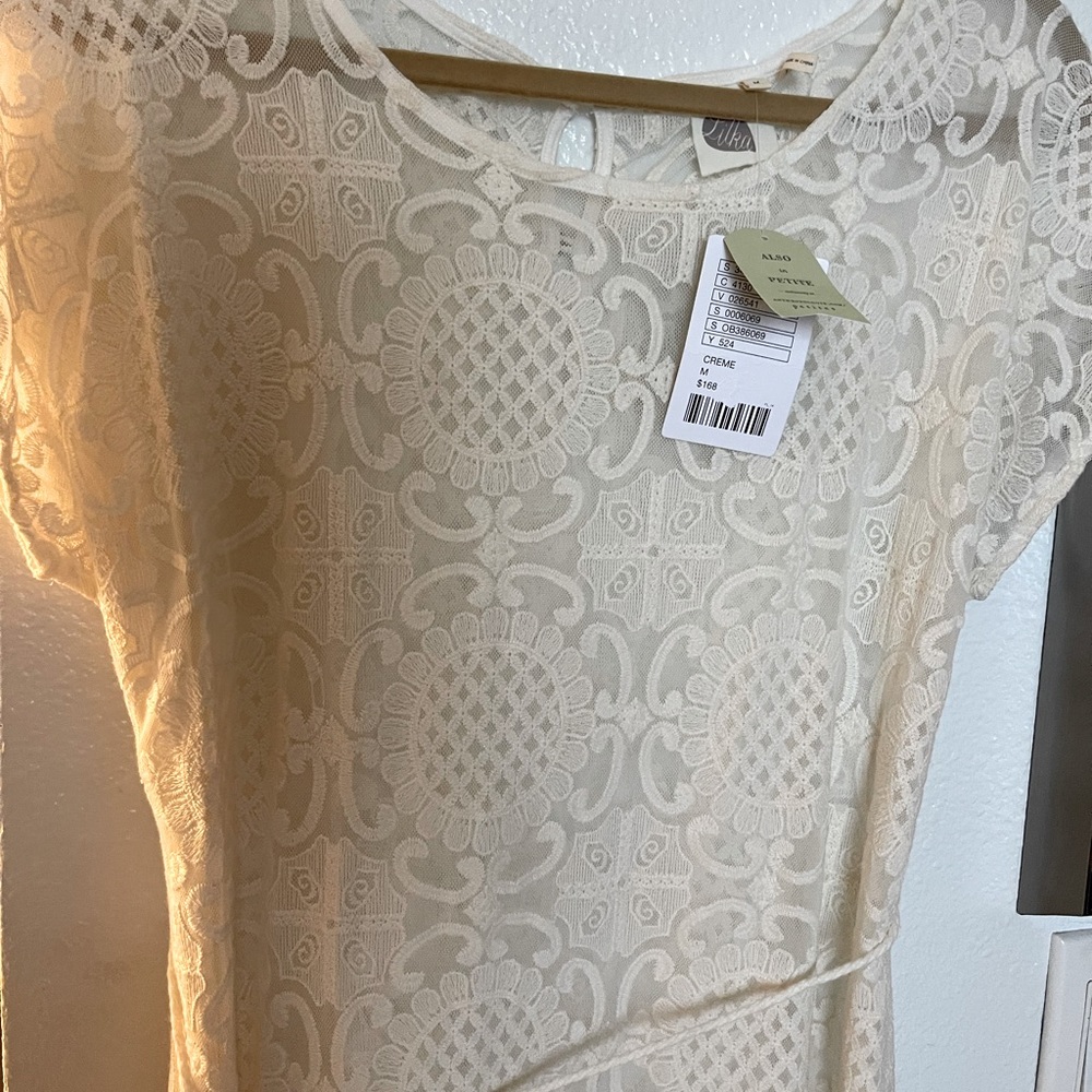 Anthropologie crème overlay. Brand new, never worn. Slits up side.